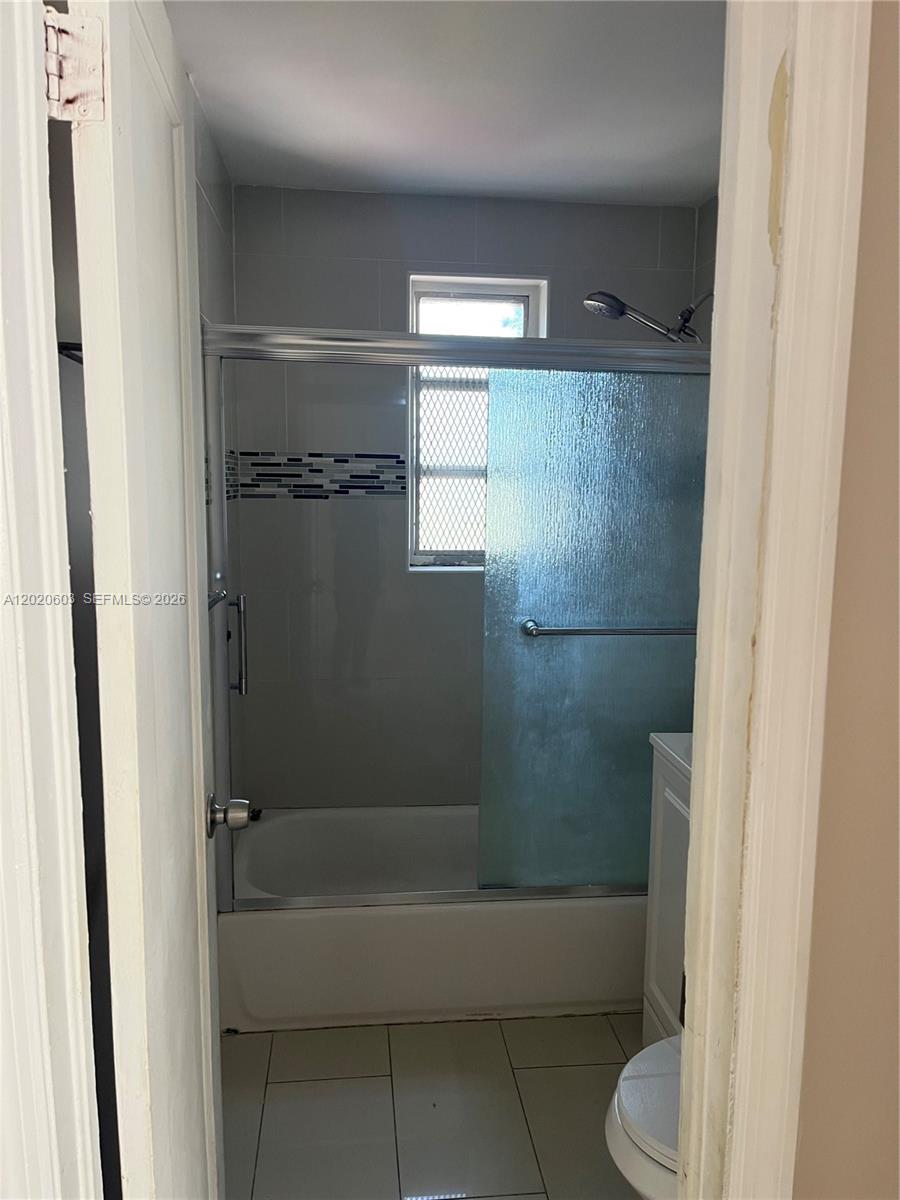 3750 Southwest 27th Street Miami, FL 33134 - Photo 4 of 4 a bathroom with a bathtub and a shower