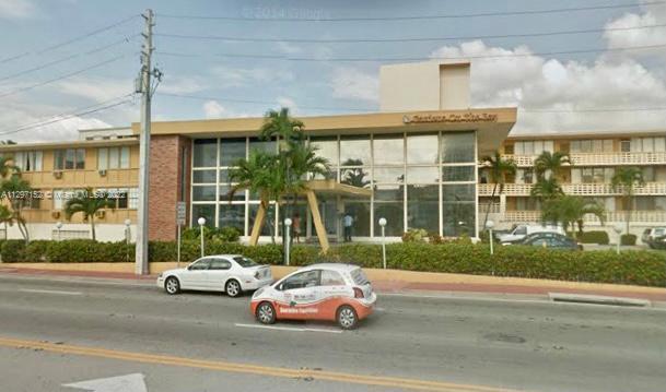 North Beach Miami, FL 33141 - Photo 5 of 10 a car parked in front of a building