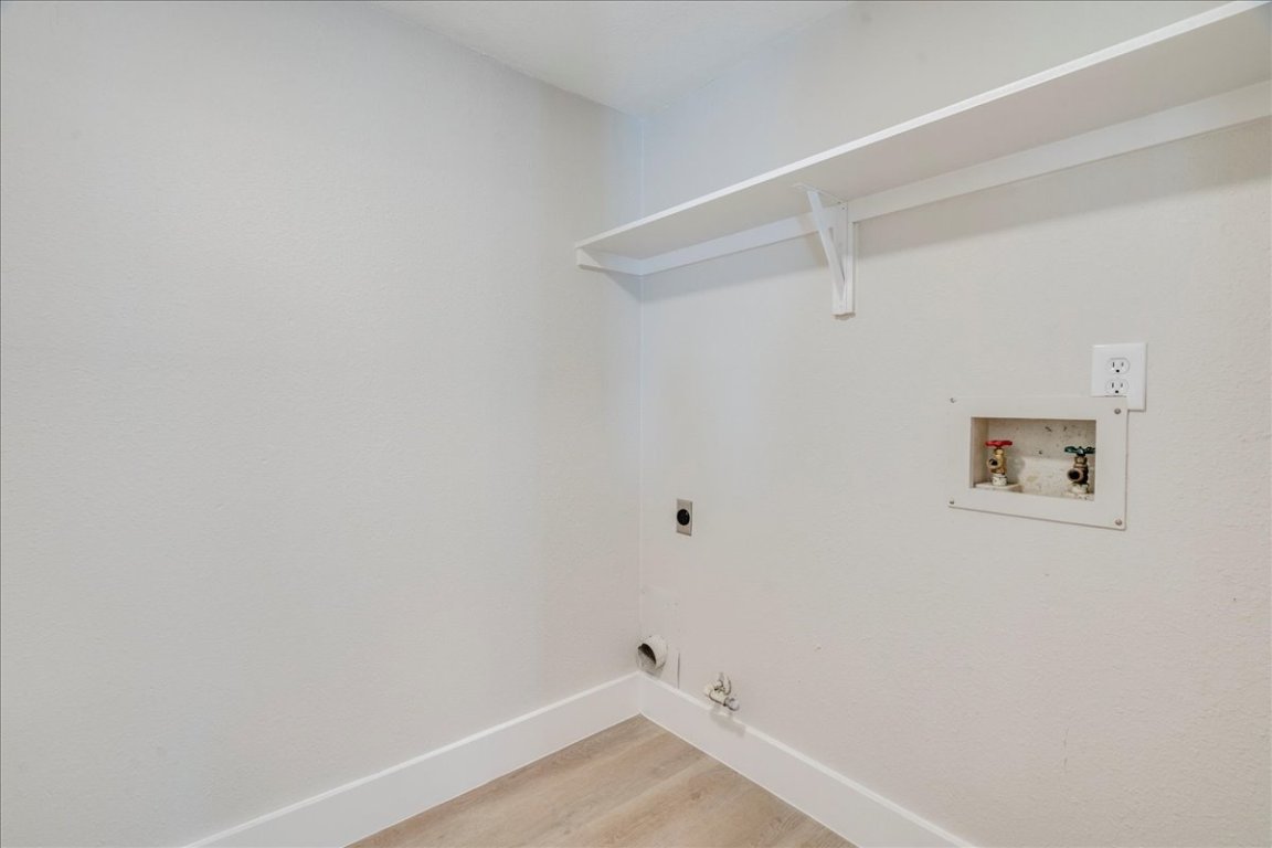 11301 Jollyville Road, Unit F2 Austin, TX 78759 - Photo 18 of 29 a view of a room with shelf