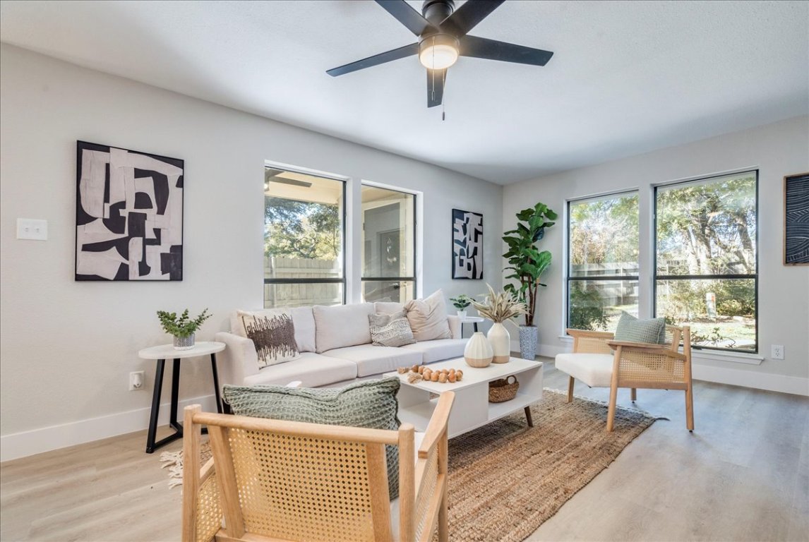11301 Jollyville Road, Unit F2 Austin, TX 78759 - Photo 7 of 29 a living room with furniture and a large window