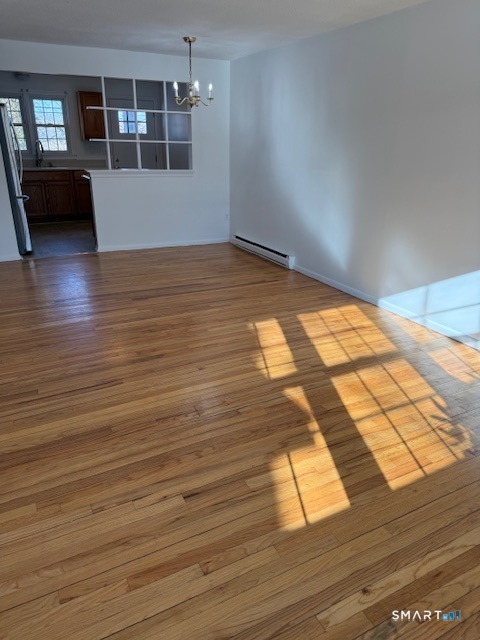 280 East Main Street, Unit E2 Clinton, CT 06413 - Photo 3 of 20 The dining area has an open pass-through to the kitchen.
