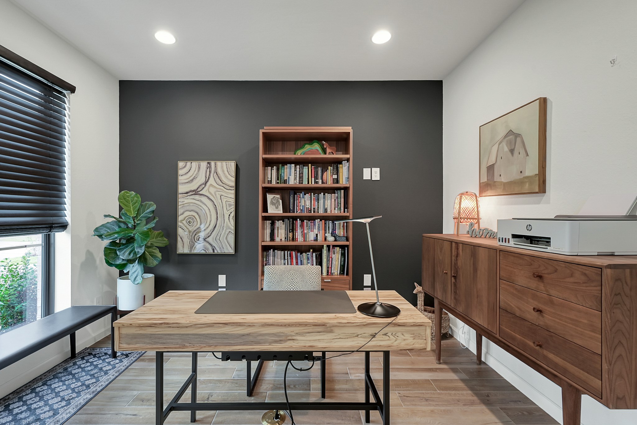 647 Sand Branch Drive Conroe, TX 77304 - Photo 4 of 19 a view of a workspace with furniture