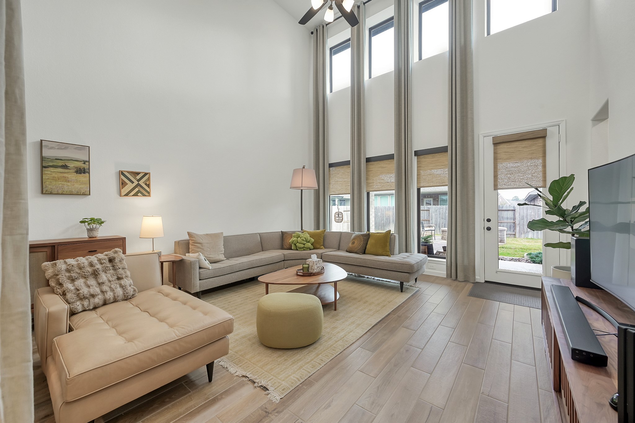 647 Sand Branch Drive Conroe, TX 77304 - Photo 7 of 19 a living room with furniture and a large window