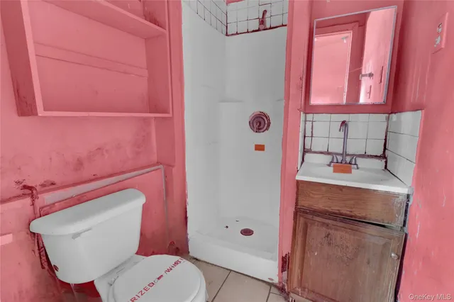 a view of a big room with windows