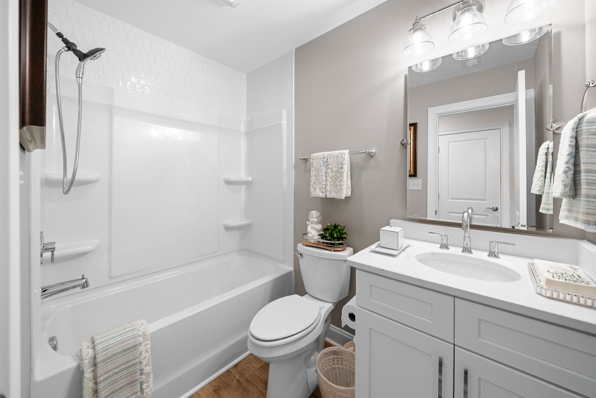 1457 Collins View Way Clarksville, TN 37043 - Photo 25 of 48 a bathroom with a sink toilet tub and shower