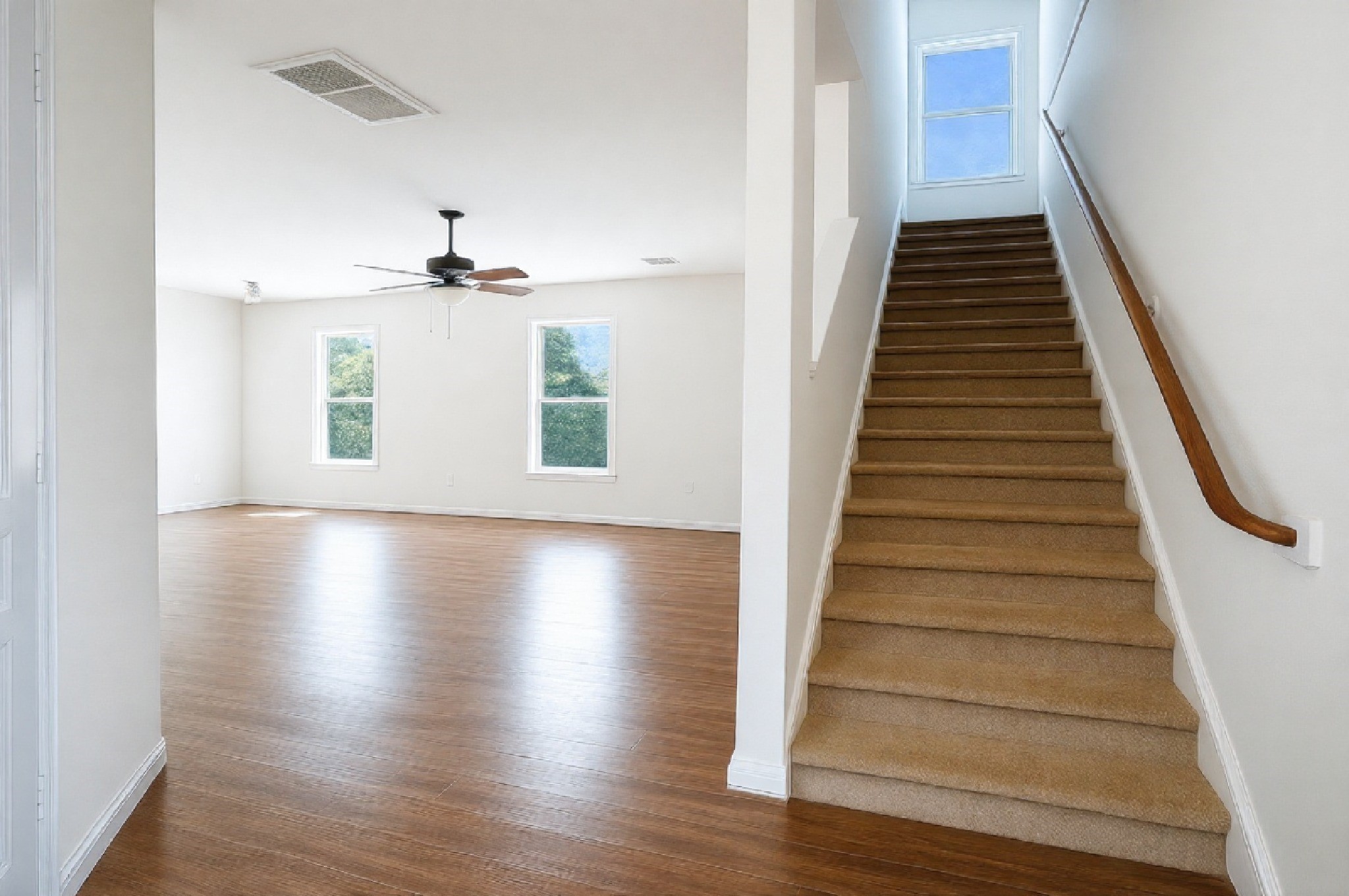 4611 Windmill Run Drive Houston, TX 77069 - Photo 2 of 36 a view of entryway and hall with wooden floor