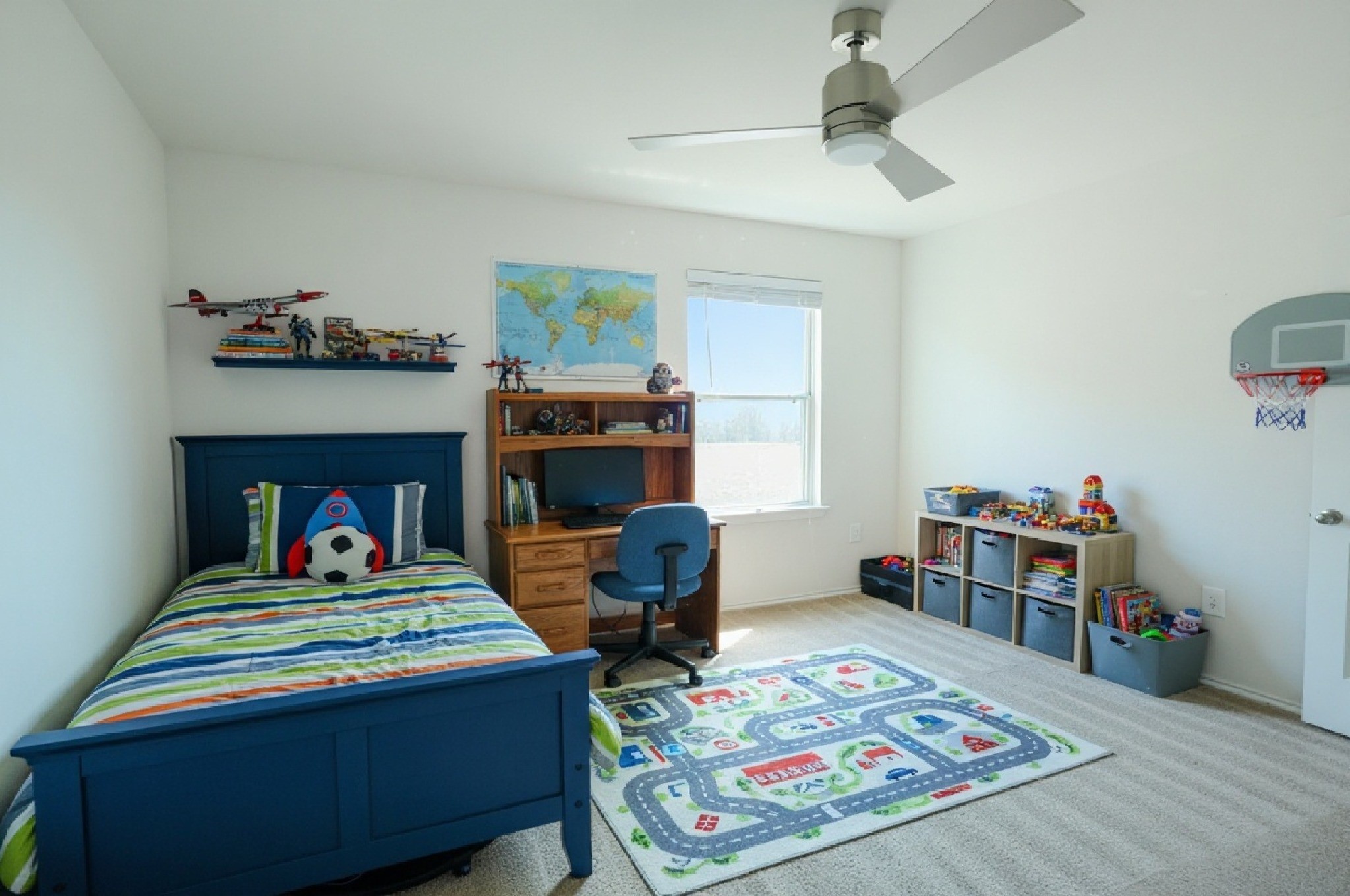 4611 Windmill Run Drive Houston, TX 77069 - Photo 27 of 36 a bedroom with a bed a rug and chair