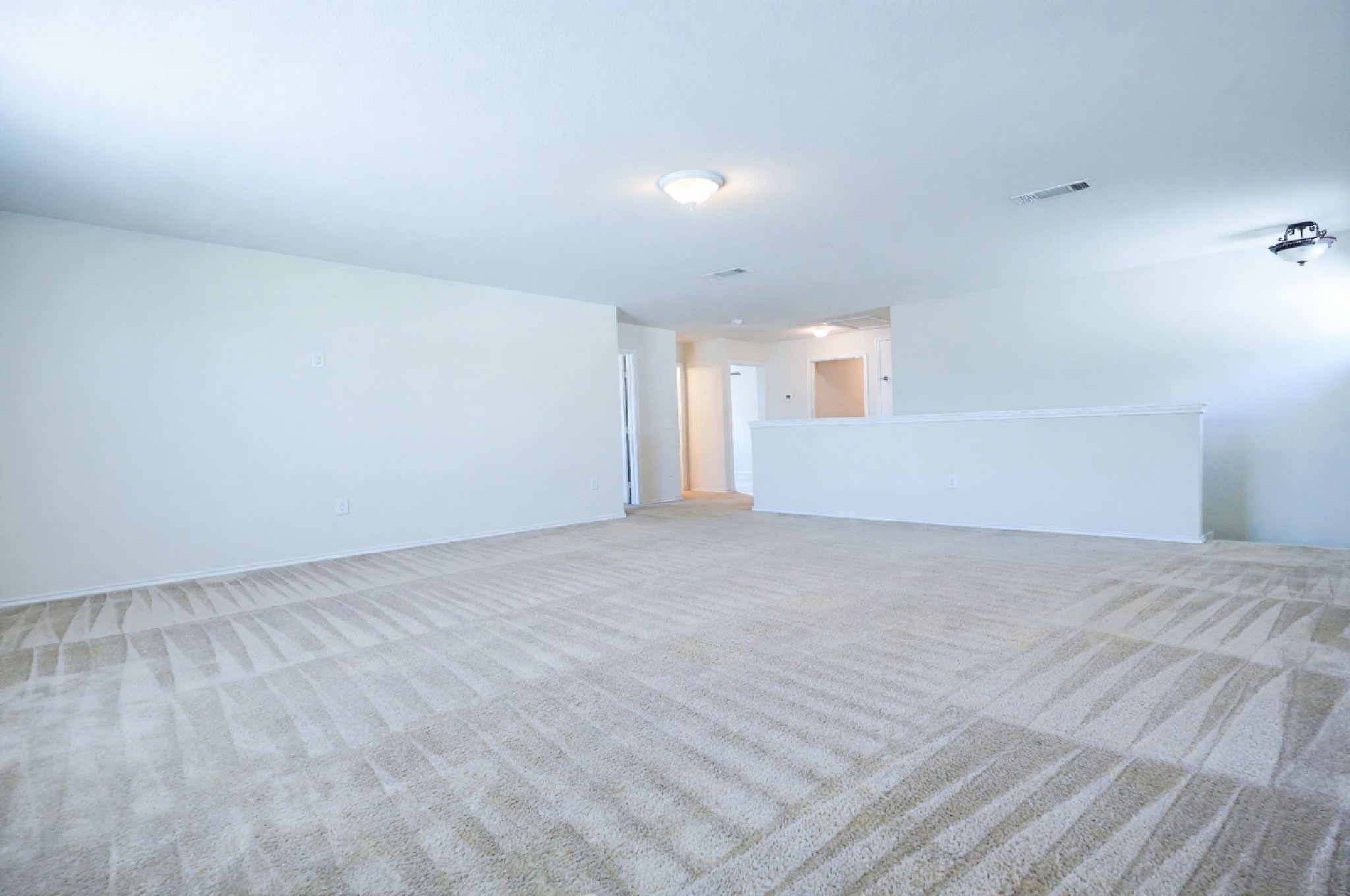 4611 Windmill Run Drive Houston, TX 77069 - Photo 30 of 36 a view of an empty room with wooden floor