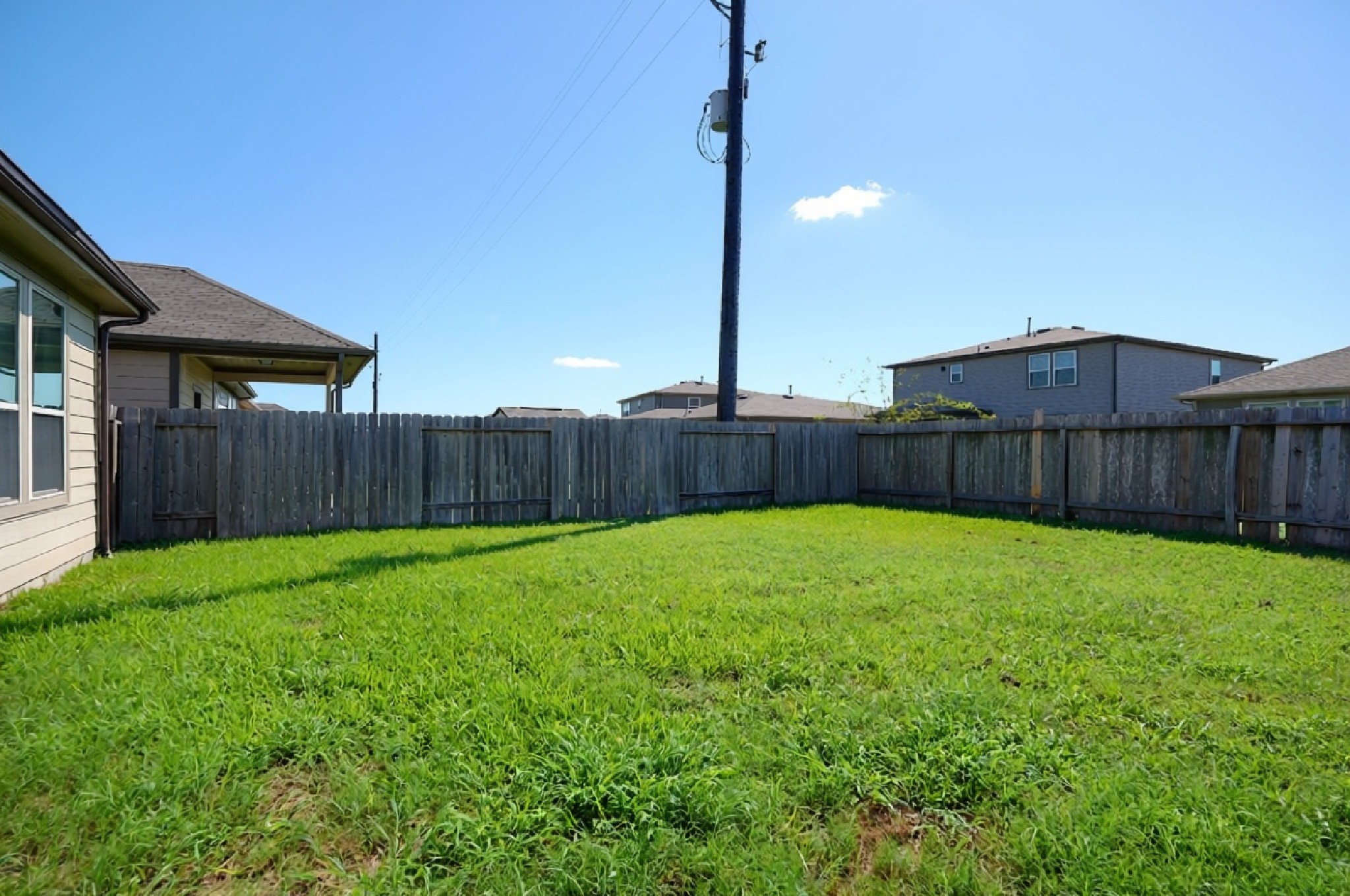 4611 Windmill Run Drive Houston, TX 77069 - Photo 34 of 36 a view of a backyard with a garden