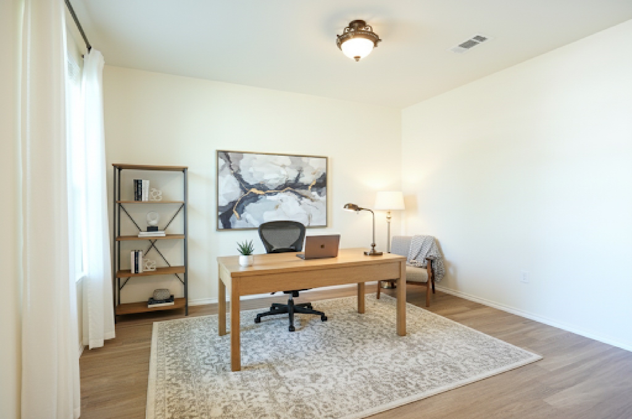 4611 Windmill Run Drive Houston, TX 77069 - Photo 10 of 36 a work room with furniture and wooden floor