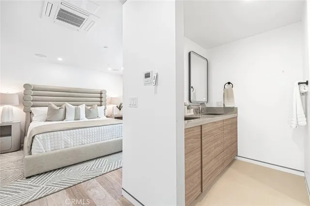 a bathroom with a sink and toilet