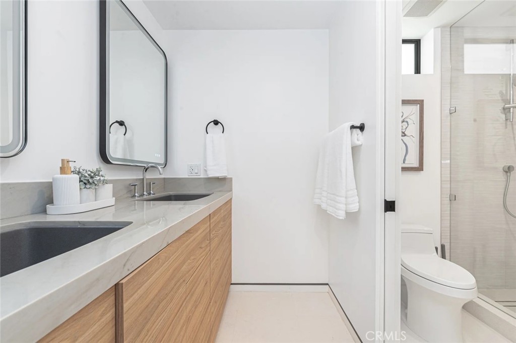 1034 West Balboa Boulevard, Unit B Newport Beach, CA 92661 - Photo 19 of 33 a bathroom with a sink and toilet