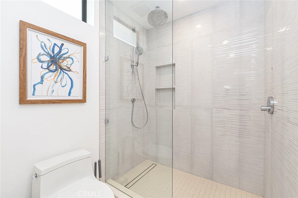 1034 West Balboa Boulevard, Unit B Newport Beach, CA 92661 - Photo 20 of 33 a bathroom with a shower and toilet