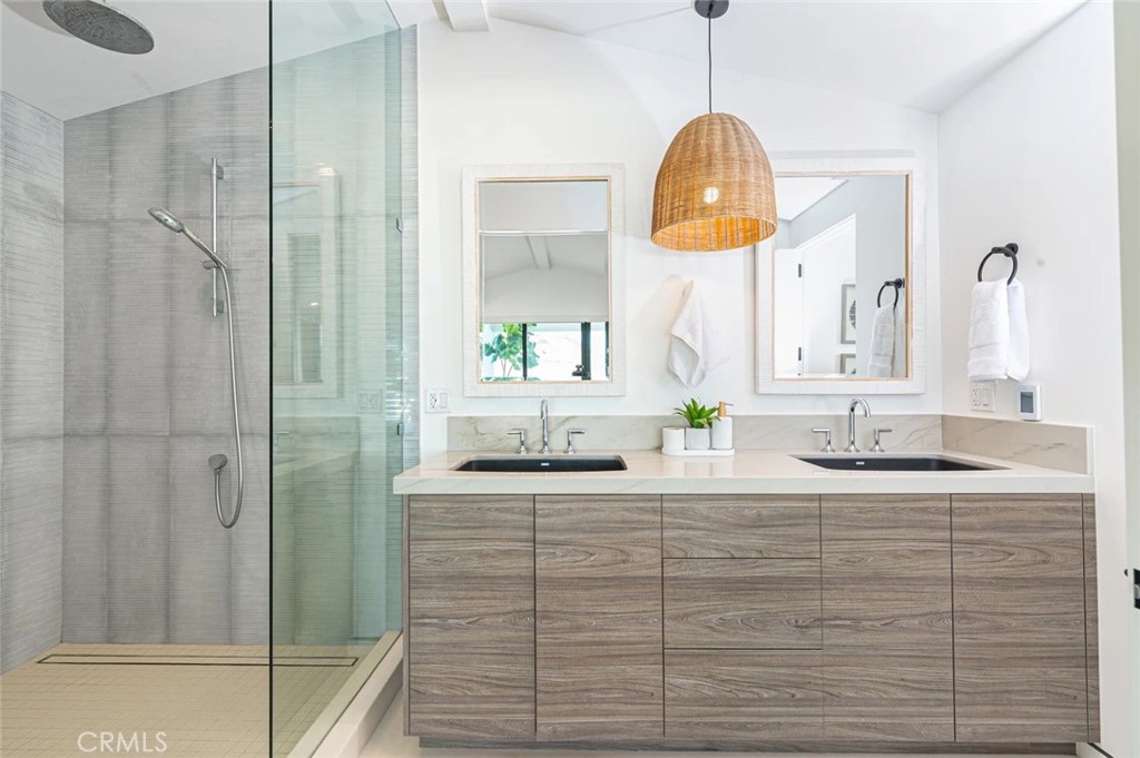1034 West Balboa Boulevard, Unit B Newport Beach, CA 92661 - Photo 23 of 33 a bathroom with a sink and a mirror