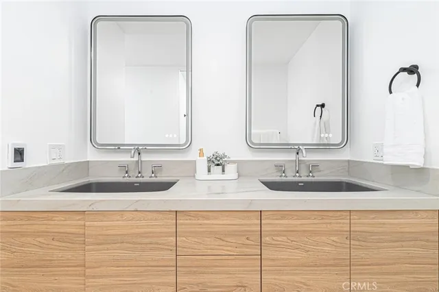 a spacious bedroom with a bed and a couch