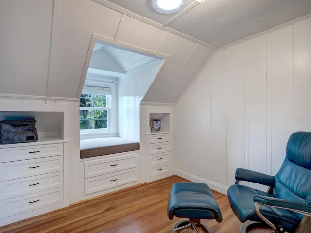 a room with furniture and a window