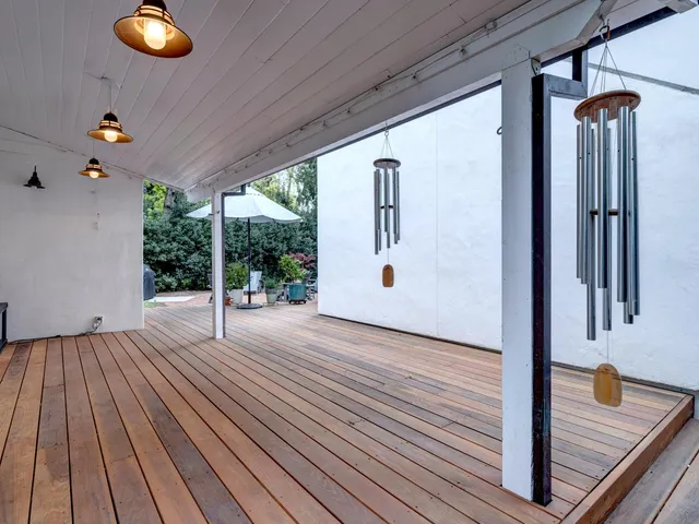 a view of outdoor space and wooden floor