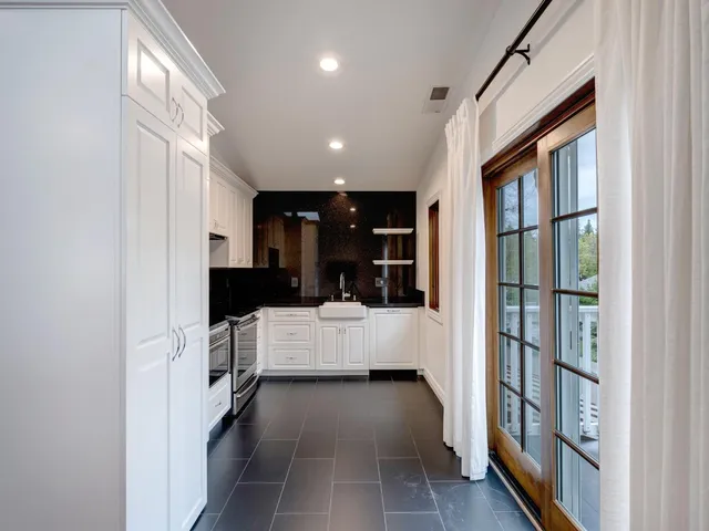 a view of living room with furniture and flat screen tv