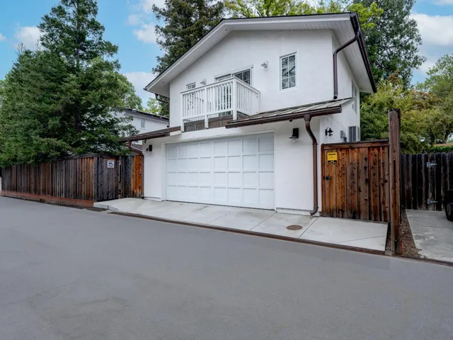 a front view of a house with a garage