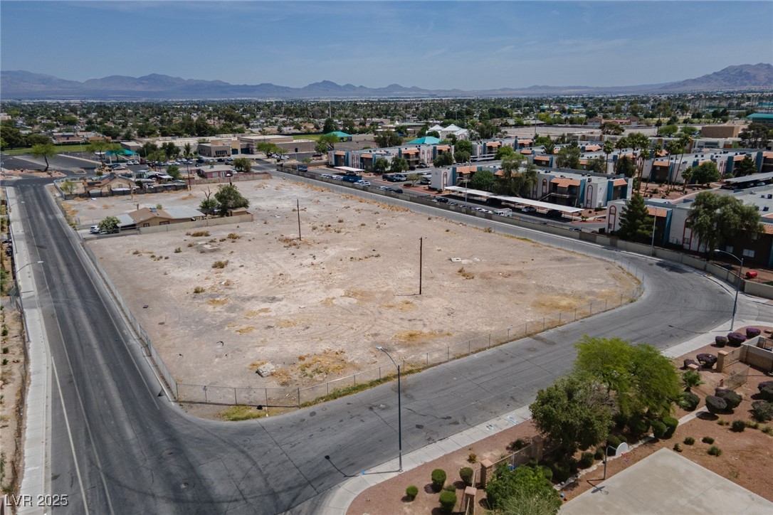 Mcknight Street Las Vegas, NV 89101 - Photo 10 of 17 Aerial view of residential area featuring a mountainous background