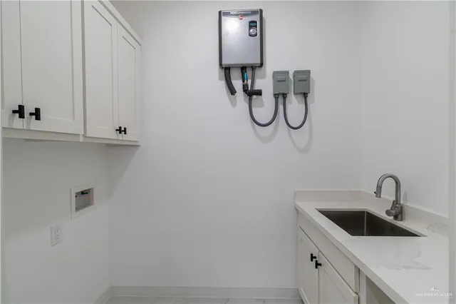 a bathroom with a sink and mirror