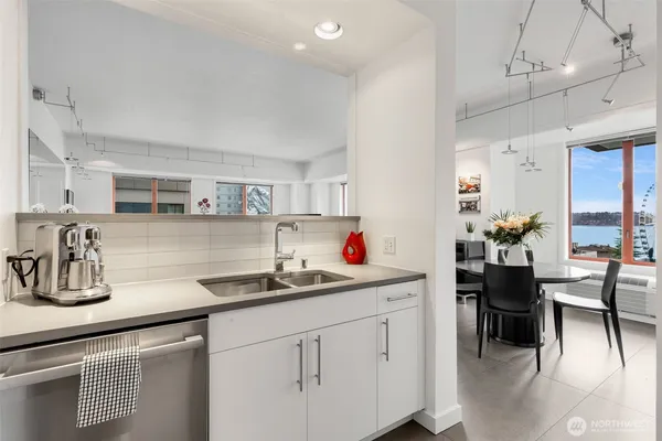 a kitchen with a sink cabinets and counter space