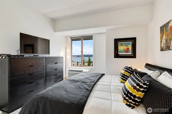 a bedroom with a bed and furniture