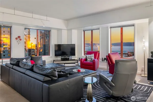 a living room with furniture or couch and a flat screen tv
