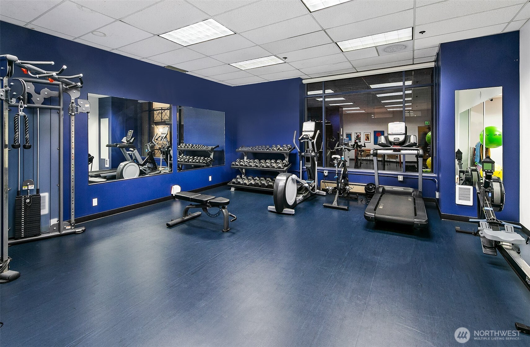 98 Union Street, Unit 206 Seattle, WA 98101 - Photo 32 of 35 a view of a room with gym equipment