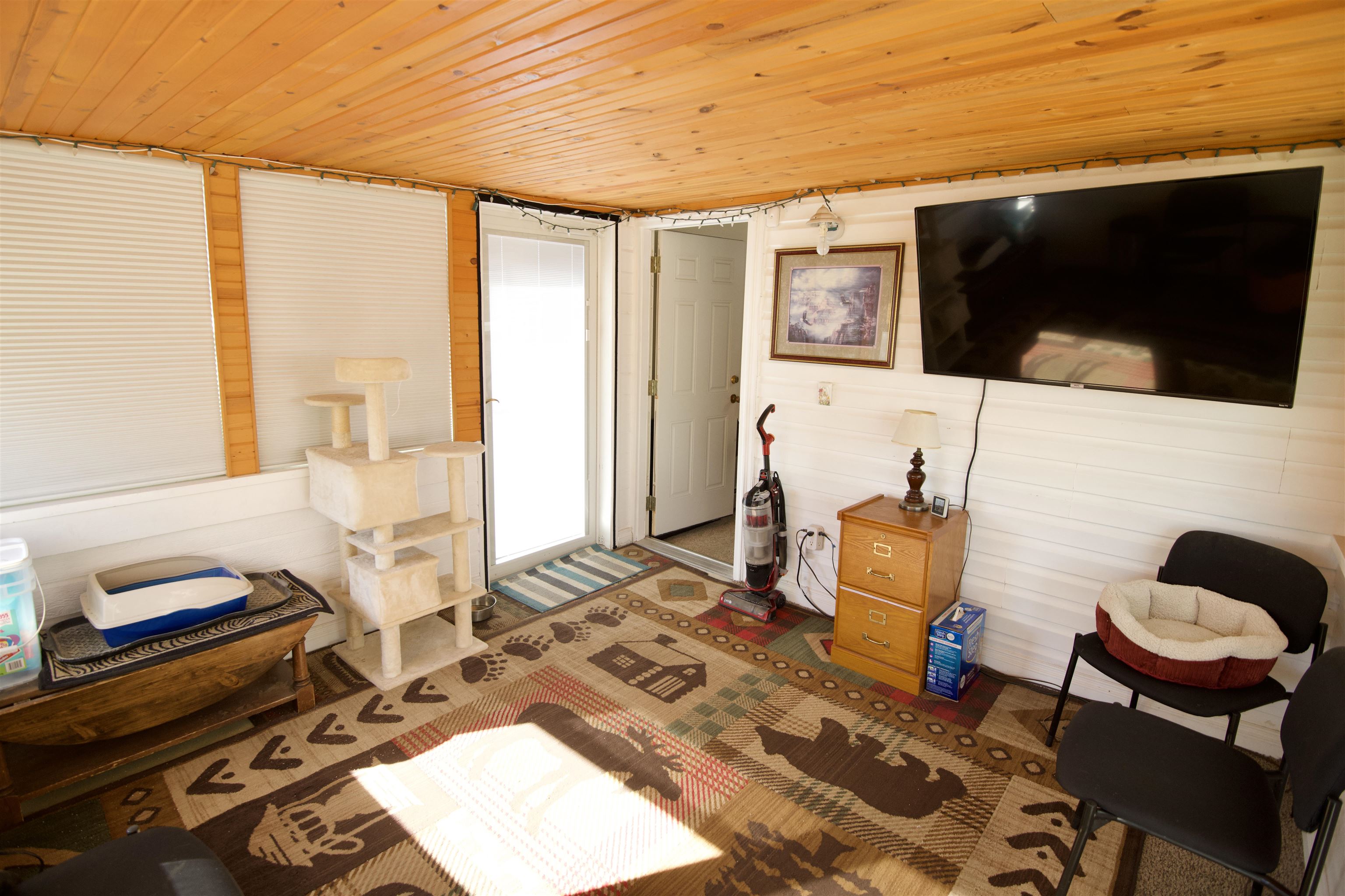 520 April Lane, Unit A Grand Junction, CO 81504 - Photo 11 of 19 a living room with furniture and a flat screen tv