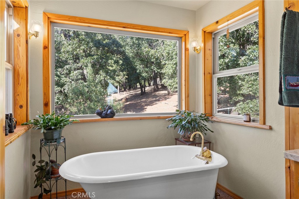 4592 Wendlis Road Forest Ranch, CA 95942 - Photo 26 of 62 Master bath clawfoot tube with garden widow