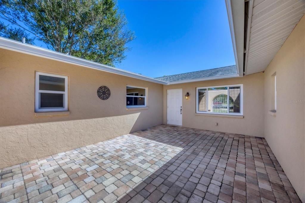 1135 Range Road Englewood, FL 34224 - Photo 12 of 42 a house view with a backyard