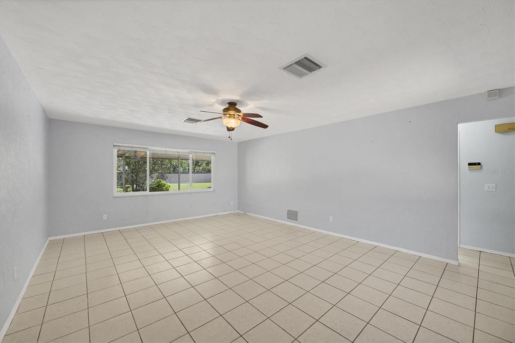 1135 Range Road Englewood, FL 34224 - Photo 13 of 42 a view of an empty room and window