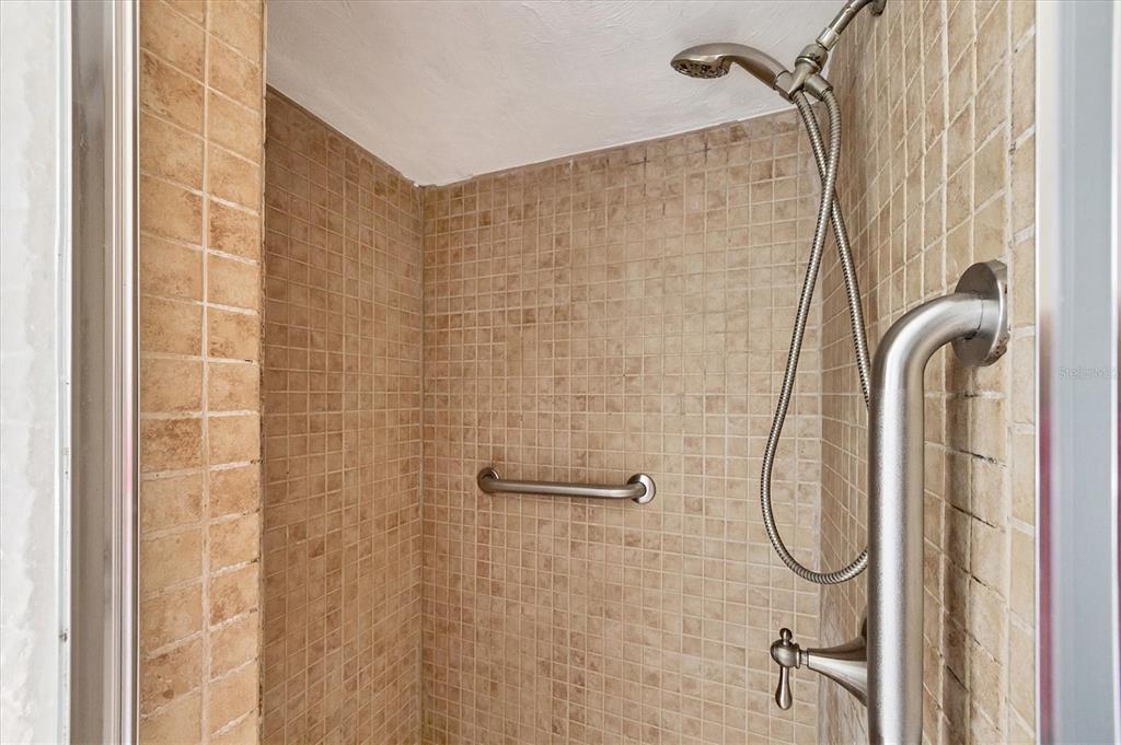 1135 Range Road Englewood, FL 34224 - Photo 31 of 42 a bathroom with a shower