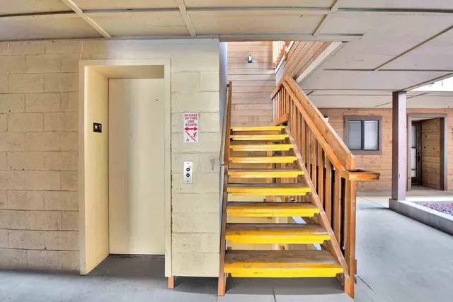 a picture of a bathroom with mirror