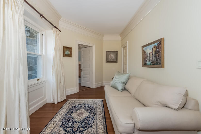 432 Field Point Road Greenwich, CT 06830 - Photo 28 of 56 a living room with furniture and a rug