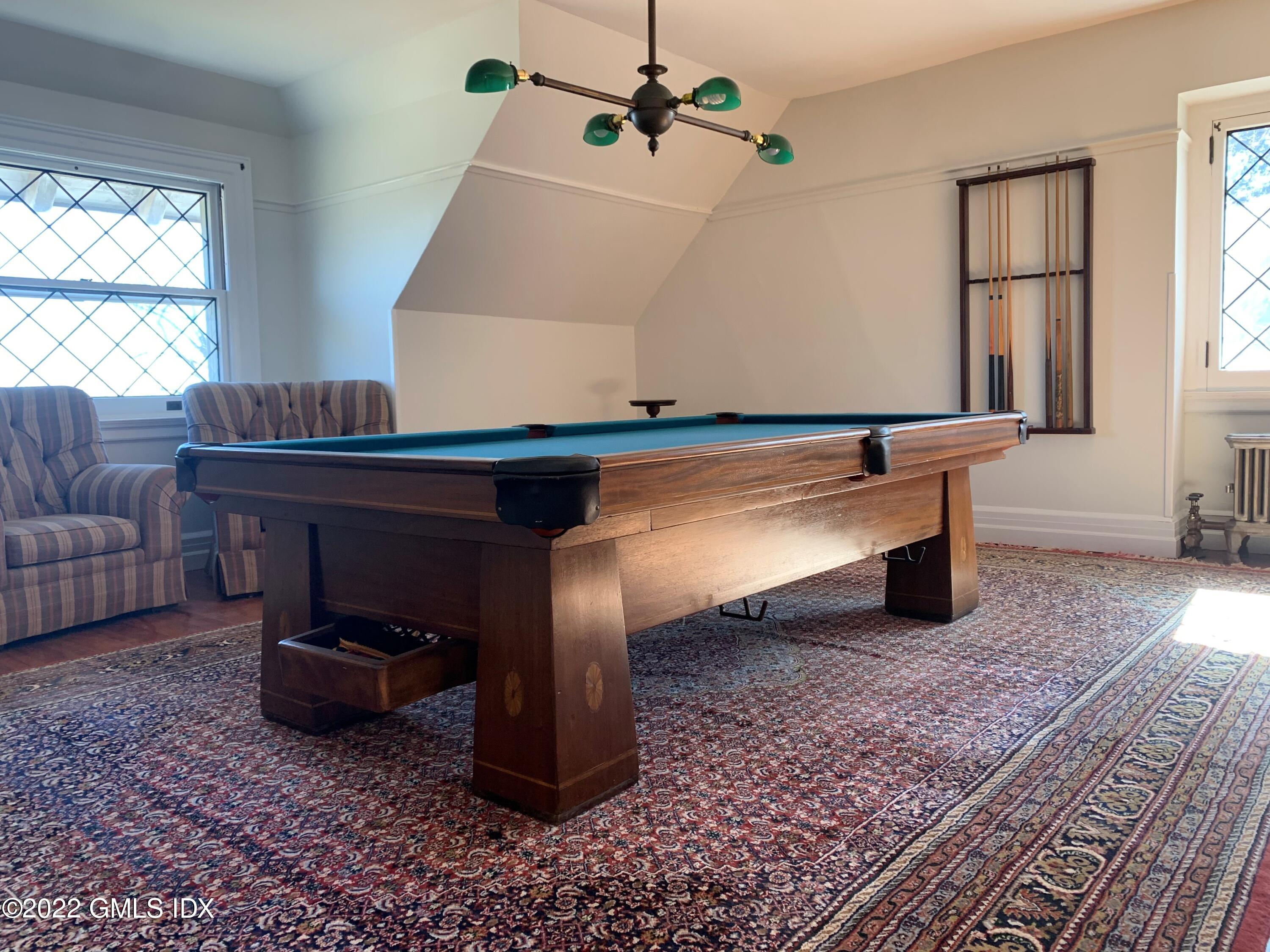 432 Field Point Road Greenwich, CT 06830 - Photo 42 of 56 a living room with furniture and a window