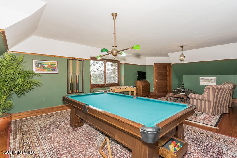 432 Field Point Road Greenwich, CT 06830 - Photo 43 of 56 a room with furniture and pool table