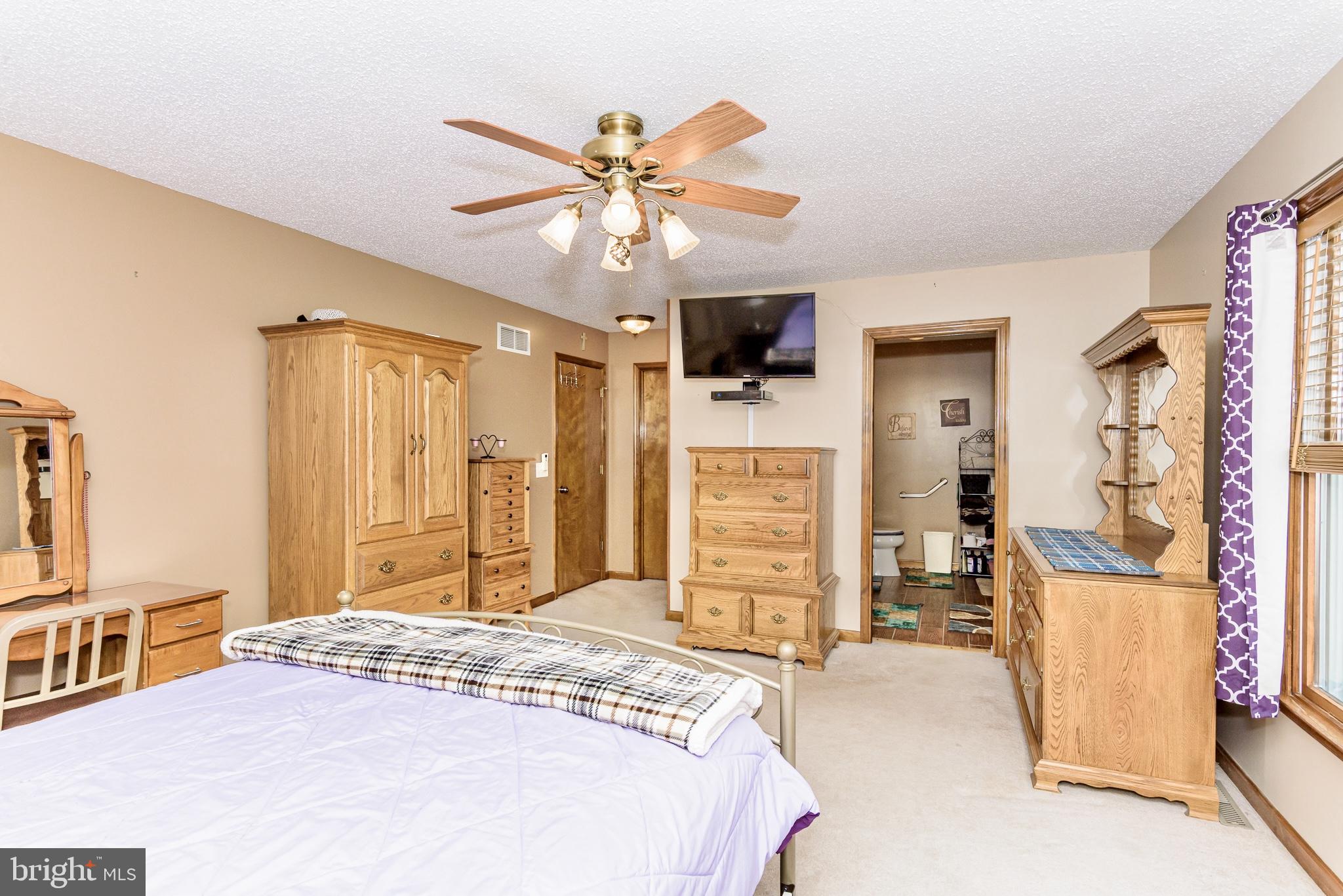 24604 Peterkins Road Georgetown, DE 19947 - Photo 19 of 49 Primary Bedroom
