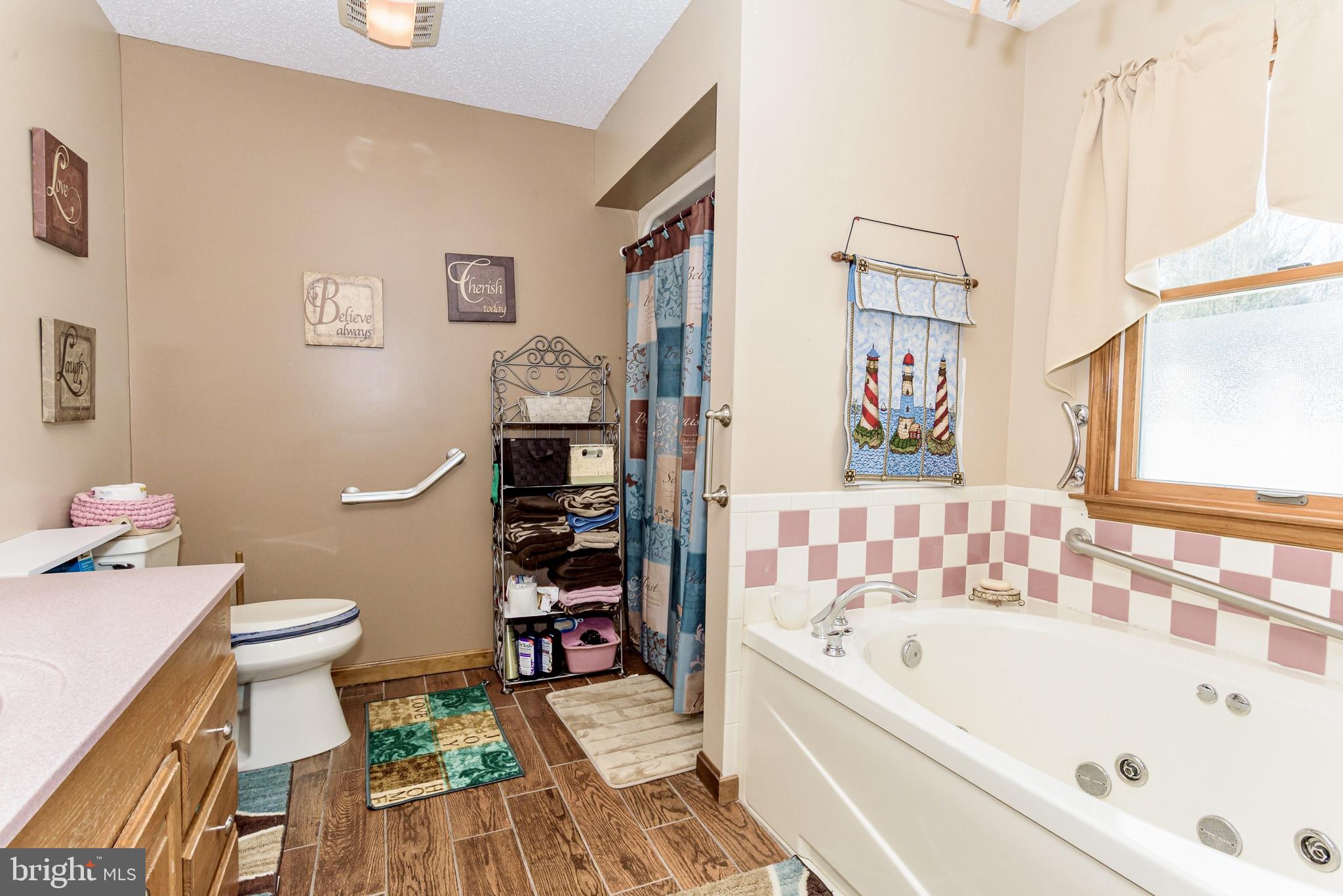 24604 Peterkins Road Georgetown, DE 19947 - Photo 21 of 49 Primary En-Suite Bathroom