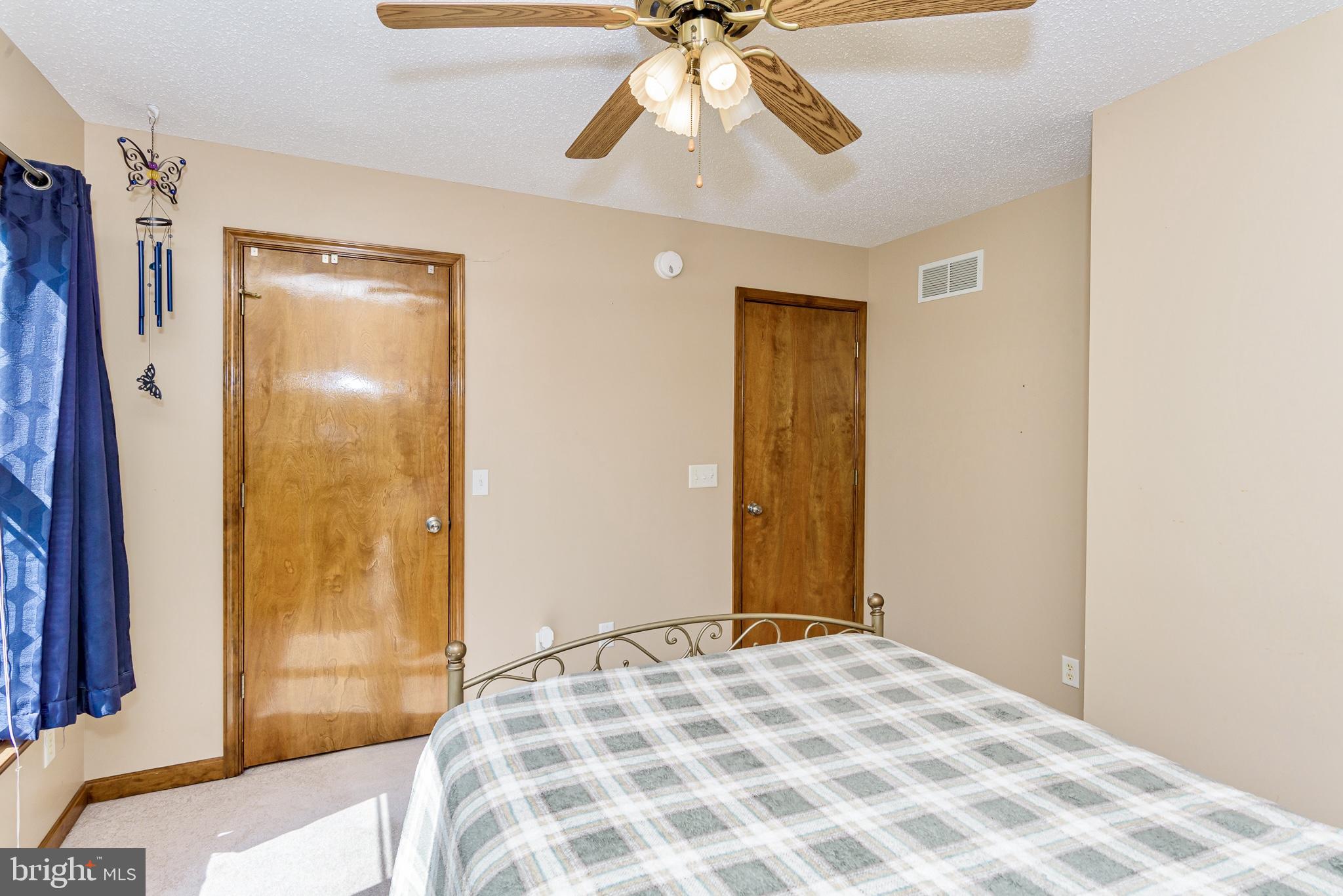 24604 Peterkins Road Georgetown, DE 19947 - Photo 26 of 49 Guest Bedroom 2