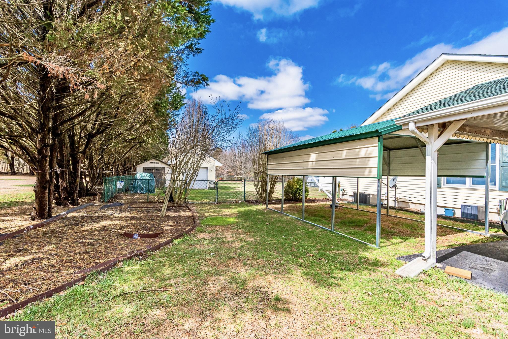 24604 Peterkins Road Georgetown, DE 19947 - Photo 40 of 49 Side Yard Sheds and Carports