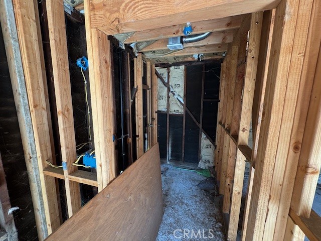 2941 Baltic Avenue Long Beach, CA 90810 - Photo 18 of 30 a view of hallway with wooden floor and stairs