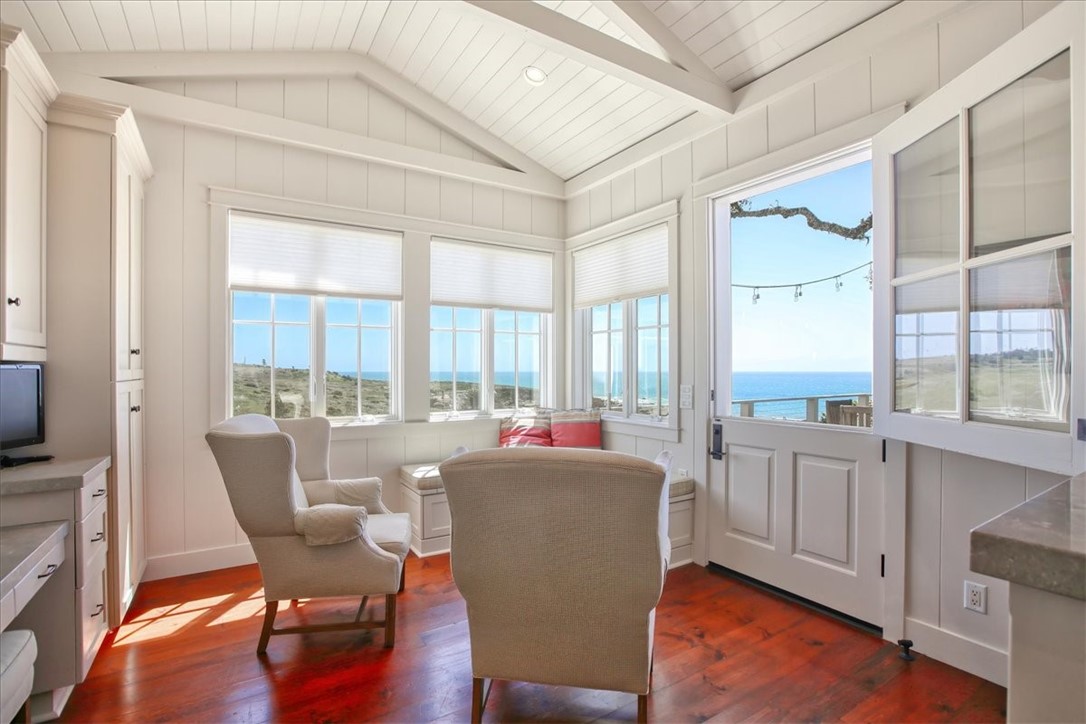 404 Huntington Road Cambria, CA 93428 - Photo 17 of 72 a living room with furniture and a large window