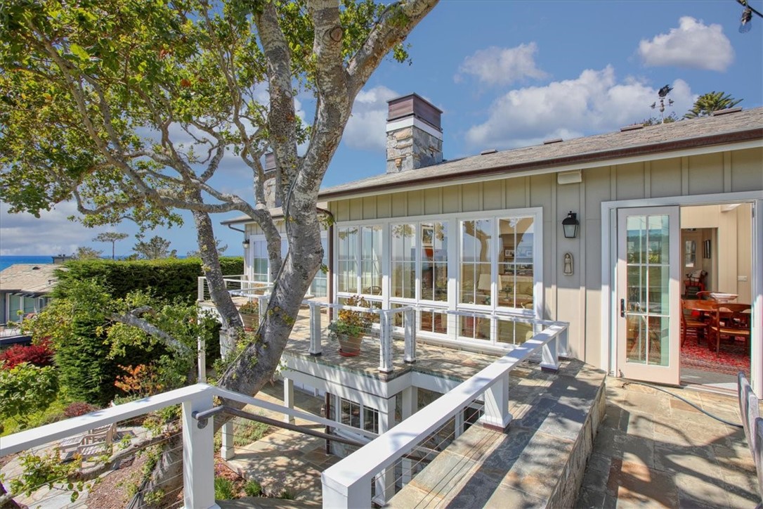 404 Huntington Road Cambria, CA 93428 - Photo 30 of 72 a view of a house with backyard and sitting area