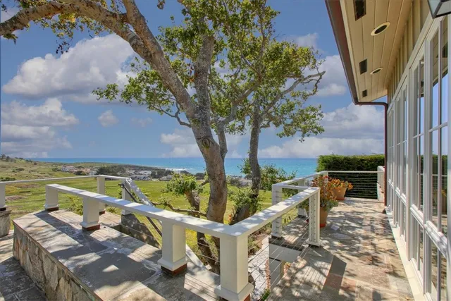 a spacious bedroom with a large bed and a window