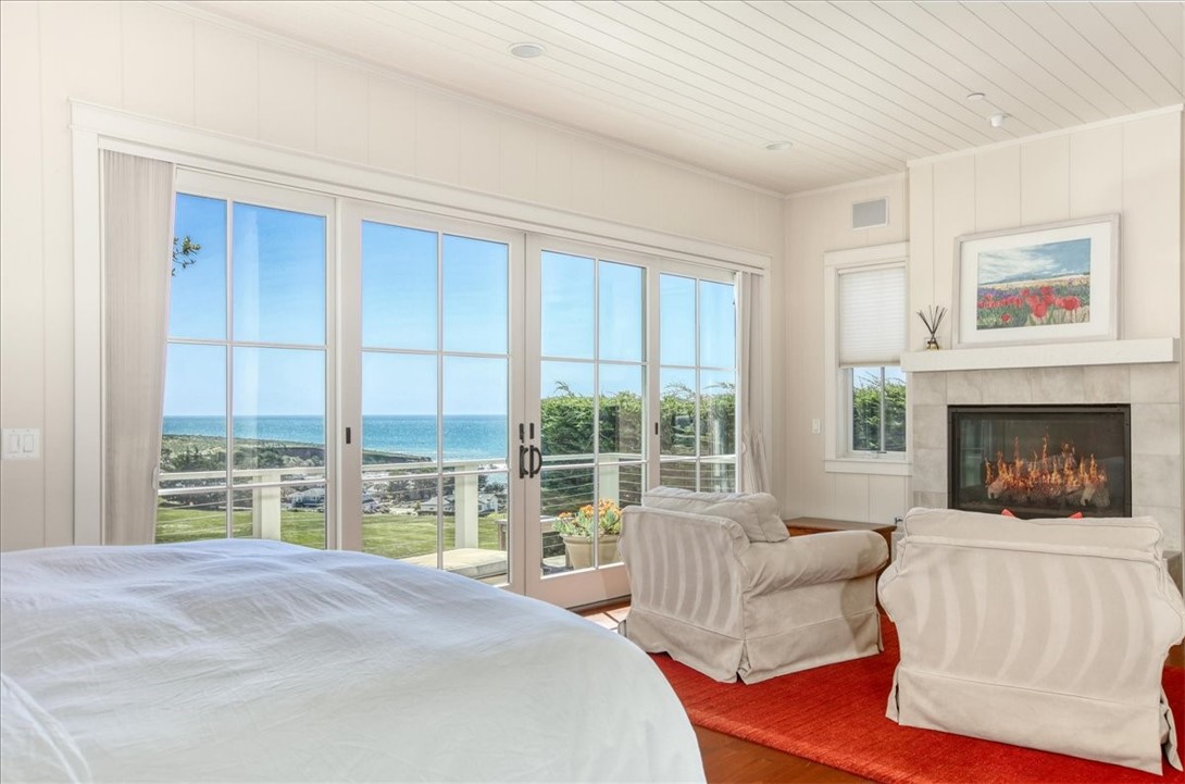 404 Huntington Road Cambria, CA 93428 - Photo 37 of 72 a living room with furniture and a large window