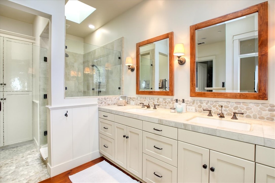 404 Huntington Road Cambria, CA 93428 - Photo 39 of 72 a bathroom with a double vanity sink mirror and double
