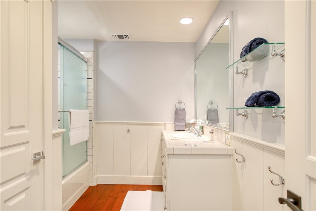 404 Huntington Road Cambria, CA 93428 - Photo 54 of 72 a bathroom with a tub sink and mirror
