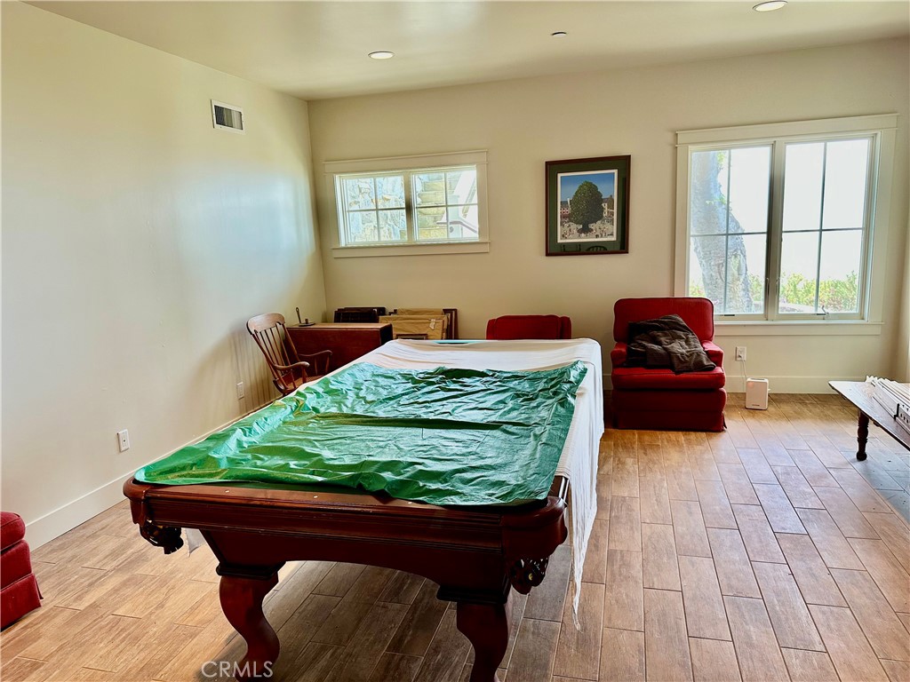 404 Huntington Road Cambria, CA 93428 - Photo 61 of 72 a living room with furniture and a potted plant